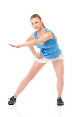Image showing Sportswoman doing stretching exorcises