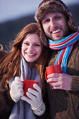 Image showing couple drink warm tea at winter