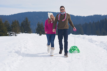 Image showing happy young couple having fun on fresh show on winter vacation