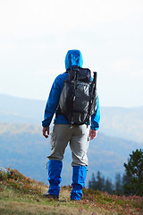 Image showing advanture man with backpack hiking