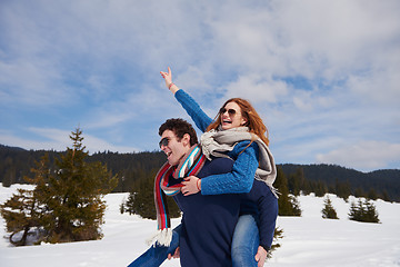 Image showing happy young couple having fun on fresh show on winter vacation