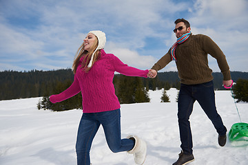 Image showing happy young couple having fun on fresh show on winter vacation