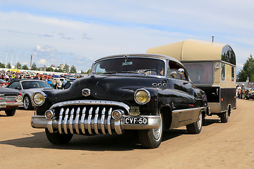 Image showing Buick Super Eight Car and Vintage Travel Trailer