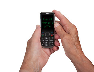 Image showing Hands of senior woman with a mobile phone