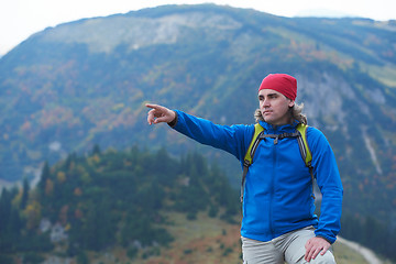 Image showing advanture man with backpack hiking