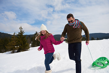 Image showing happy young couple having fun on fresh show on winter vacation