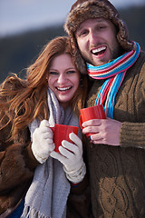 Image showing couple drink warm tea at winter