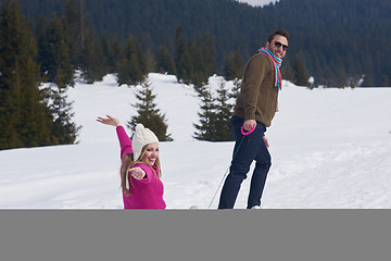 Image showing happy young couple having fun on fresh show on winter vacation