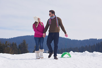 Image showing happy young couple having fun on fresh show on winter vacation