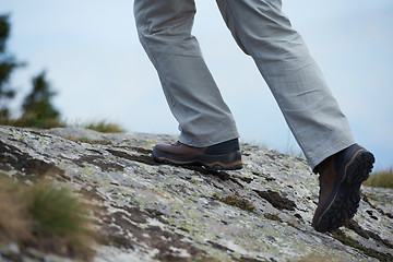 Image showing hiking man with trekking boots