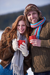 Image showing couple drink warm tea at winter