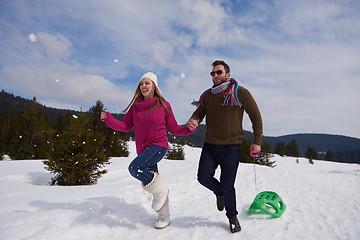 Image showing happy young couple having fun on fresh show on winter vacation