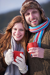 Image showing couple drink warm tea at winter