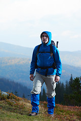 Image showing advanture man with backpack hiking