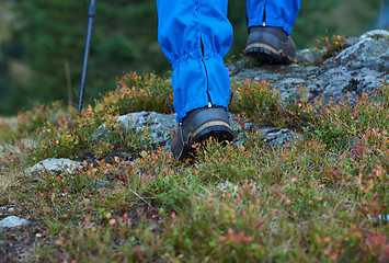 Image showing hiking man with trekking boots