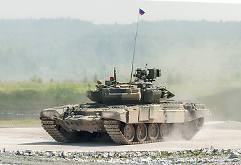 Image showing Tank T-80s in motion