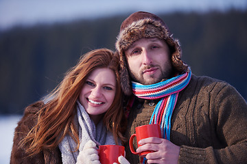 Image showing couple drink warm tea at winter