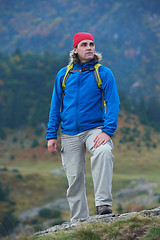 Image showing advanture man with backpack hiking
