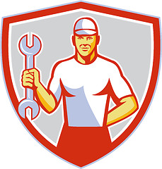 Image showing Mechanic Holding Wrench Crest Retro