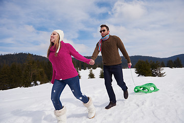 Image showing happy young couple having fun on fresh show on winter vacation