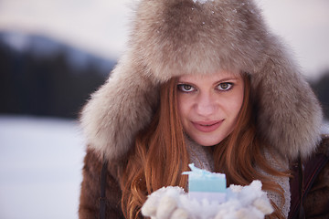 Image showing winter girl with gift