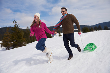 Image showing happy young couple having fun on fresh show on winter vacation