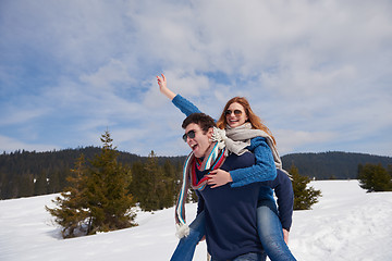 Image showing happy young couple having fun on fresh show on winter vacation