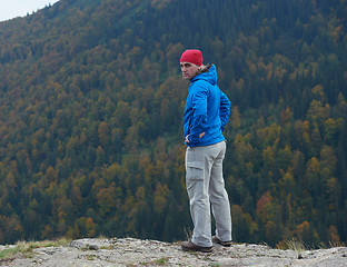 Image showing advanture man with backpack hiking