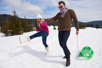 Image showing happy young couple having fun on fresh show on winter vacation