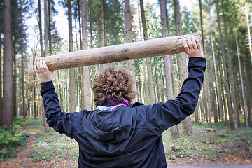 Image showing Woman fitness exercises in forest