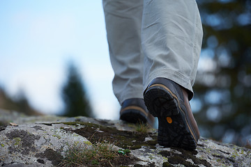 Image showing hiking man with trekking boots