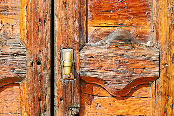 Image showing europe old in  italy   close brown door  lock  closeup