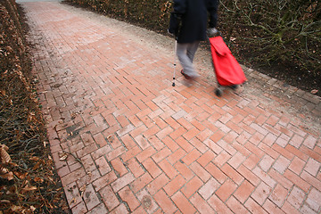 Image showing Old man  passing 