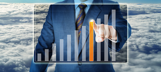 Image showing Torso Of Manager Selecting A Bar In Growth Chart