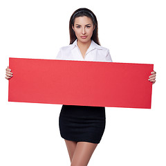 Image showing Businesswoman holding a banner