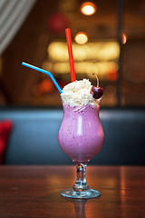 Image showing Cherry milkshake with fruits