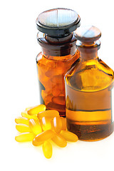 Image showing Fish oil is in liquid form and in capsules.