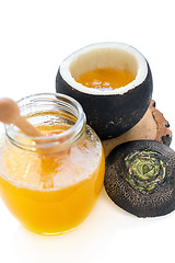 Image showing Black radish and a jar of honey.