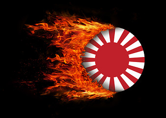 Image showing Flag with a trail of fire - Japan