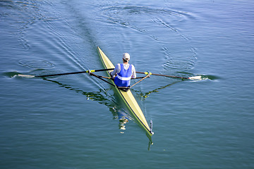 Image showing Young man Rower in a boat