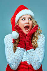 Image showing portrait of girl dressed in santa hat 