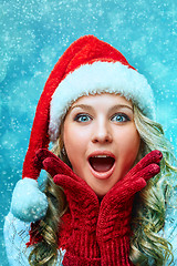 Image showing portrait of girl dressed in santa hat 