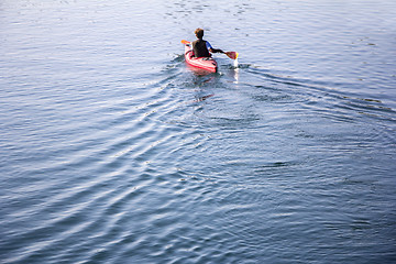 Image showing Young man Rower in a boat