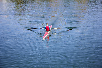 Image showing Young man Rower in a boat