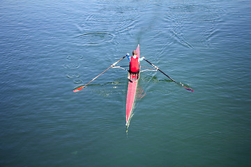 Image showing Young man Rower in a boat