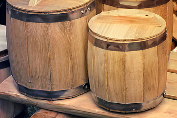 Image showing Wooden oak barrels for storing wine.
