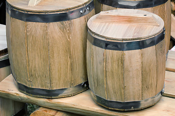 Image showing Wooden oak barrels for storing wine.