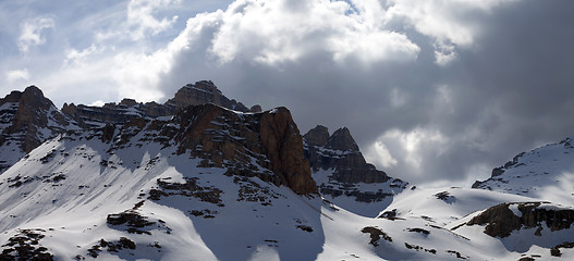 Image showing Panoramic view on winter mountains in storm clouds