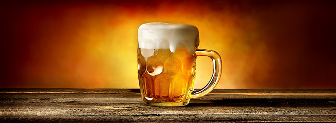 Image showing Beer in mug on table