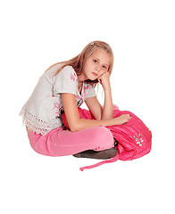 Image showing Sad looking girl with pink backpack.